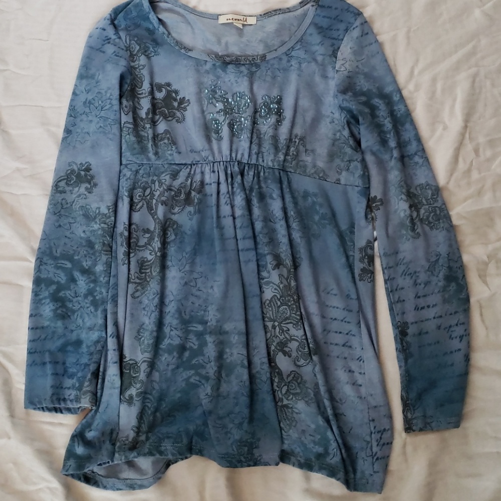 One World embellished blouse.